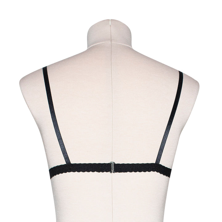 Peachy pink sheer mesh bralette with black velvet bow appliqué